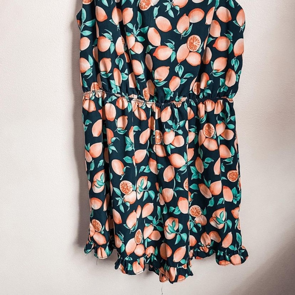 Lemon print romper with bow back